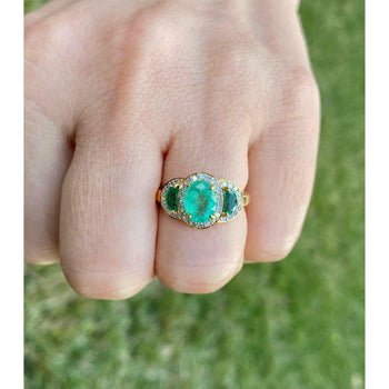 1.25 Carat Oval Colombian Emerald & Diamond Halo Three Stone Ring – Assay Jewelers