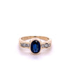 1.48 Carat Oval Cut Blue Sapphire With Princess Cut Diamond Ring in 18k Gold