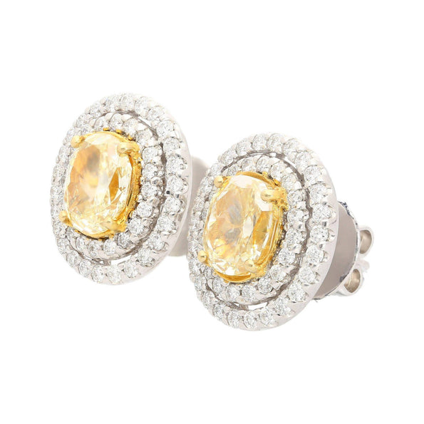 3.73 Carat TW Oval Cut Fancy Yellow Diamond Double Halo Stud Earrings