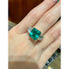 4.26 Carat Vivid Green Colombian Muzo Mine Emerald & Emerald Cut Side Diamond Ring