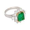 4.42 Carat TW Colombian Emerald with Round & Emerald Cut Diamond Halo Ring