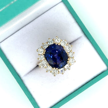 Bague halo en saphir bleu taille ovale de 7,15 carats et diamants en or jaune 14K – Assay Jewelers