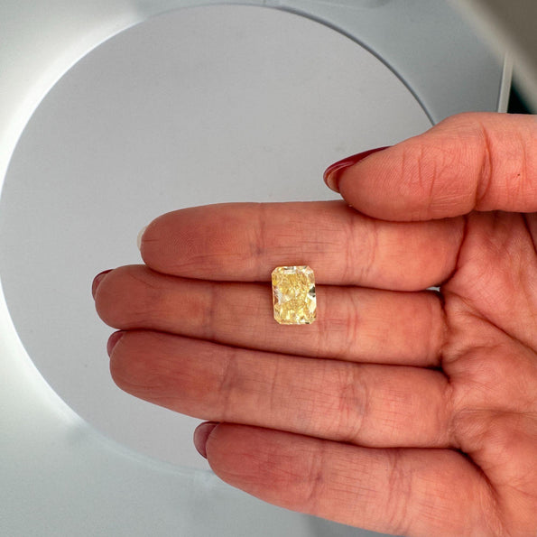 GIA Certified 4.12 Carat Fancy Yellow Radiant Cut Diamond Halo Engagement Ring