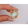 GIA Certified 8 Carat White Opal With Orange Garnet & Aquamarine Halo Ring