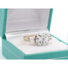 Natural 4.21 Carat Round Diamond Engagement Ring With Baguette Diamonds in Two Tone 18k Gold