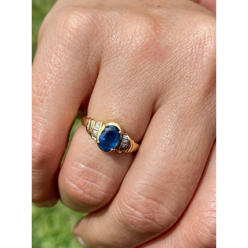 Oval Cut Blue Sapphire and Baguette Cut Diamond Engagement Ring