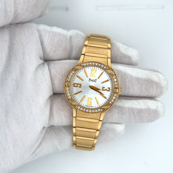 Montre Piaget Polo pour femme 32 mm en or jaune 18 carats avec lunette en diamant et papiers Piaget – Assay Jewelers