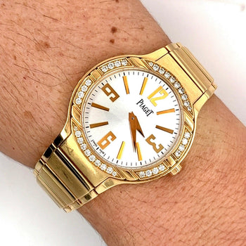 Montre Piaget Polo pour femme 32 mm en or jaune 18K avec lunette en diamant et papiers Piaget – Assay Jewelers