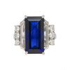 Vintage 8.56 carat Vivid Blue Sapphire and Trapezoid Diamond Ring in Platinum