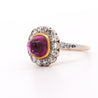 Vintage Cabochon Pinkish Purple Sapphire & Old Euro Diamond Floral Halo Ring